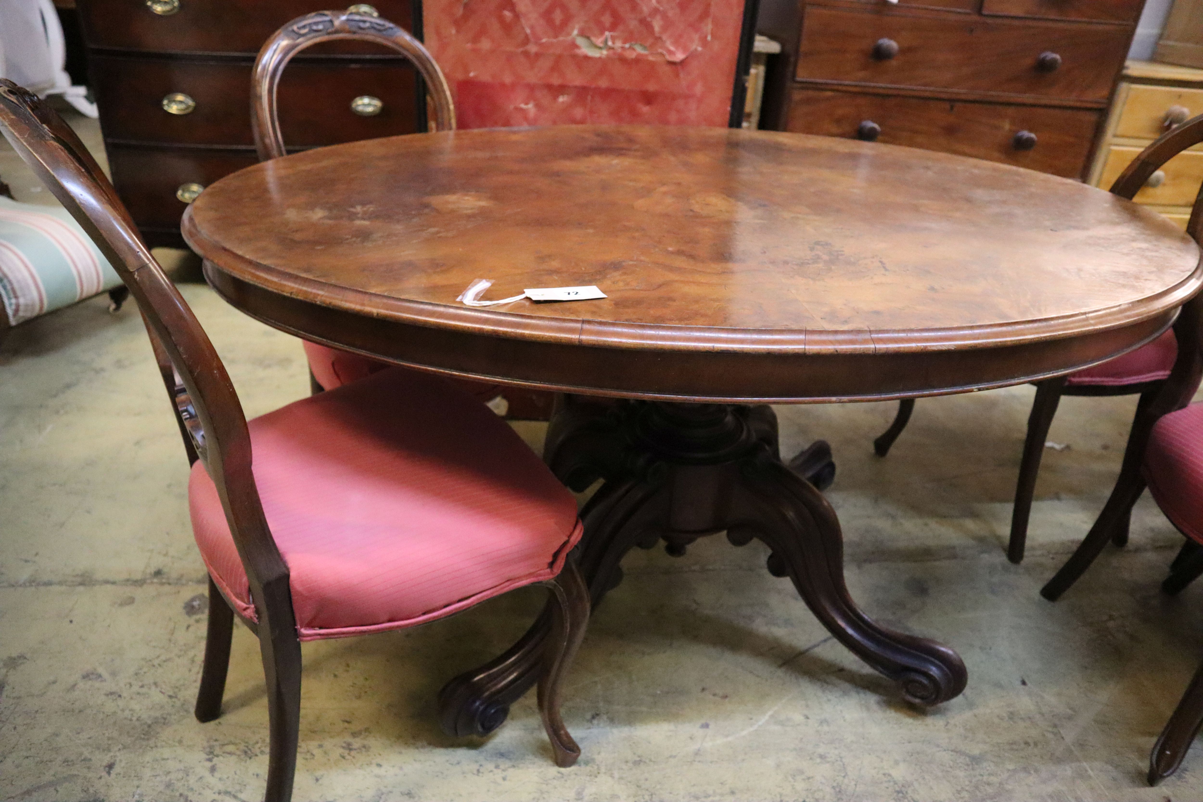 A Victorian oval burr walnut loo table, width 135cm, depth 99cm, height 73cm together with four Victorian walnut balloon back dining ch